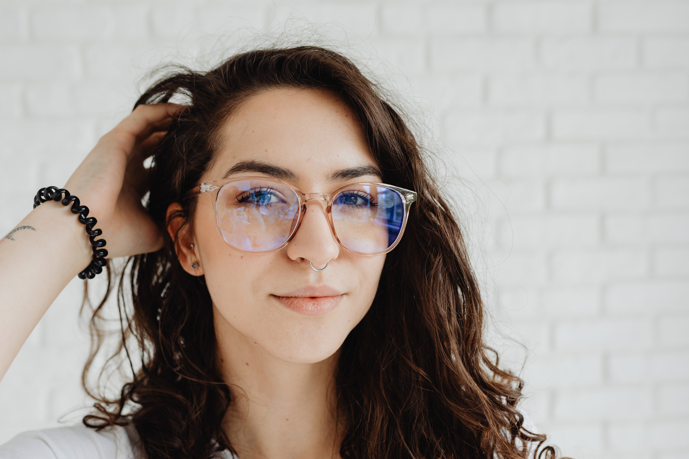 Woman in Clear Glass Framed Eyeglasses